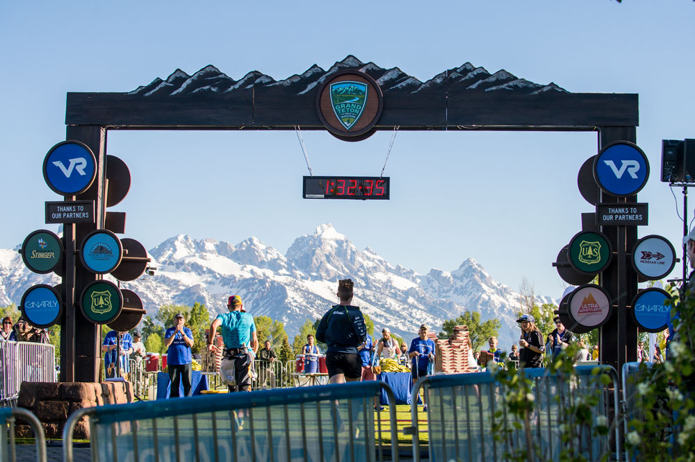 Runners cross the finish line of the Grand Teton Half Marathon. Photo courtesy of Lucid Images.