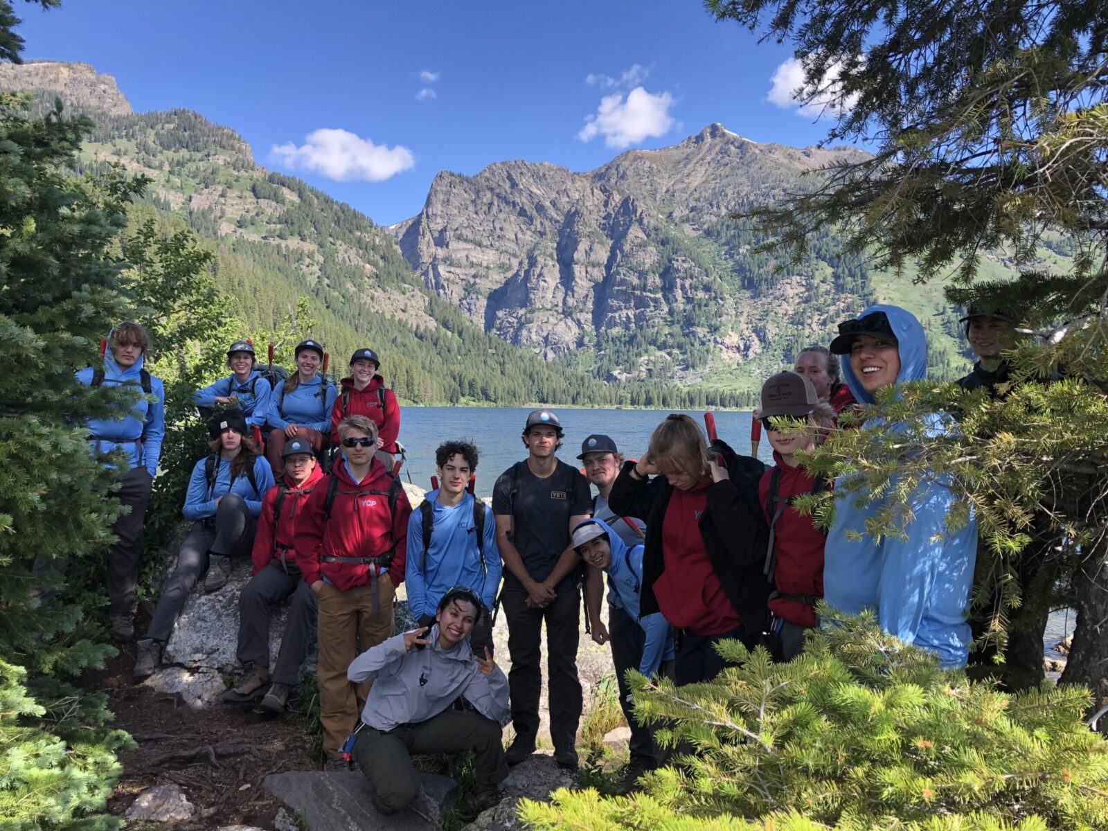 The crew stops for a break in the shade at Phelps Lake.