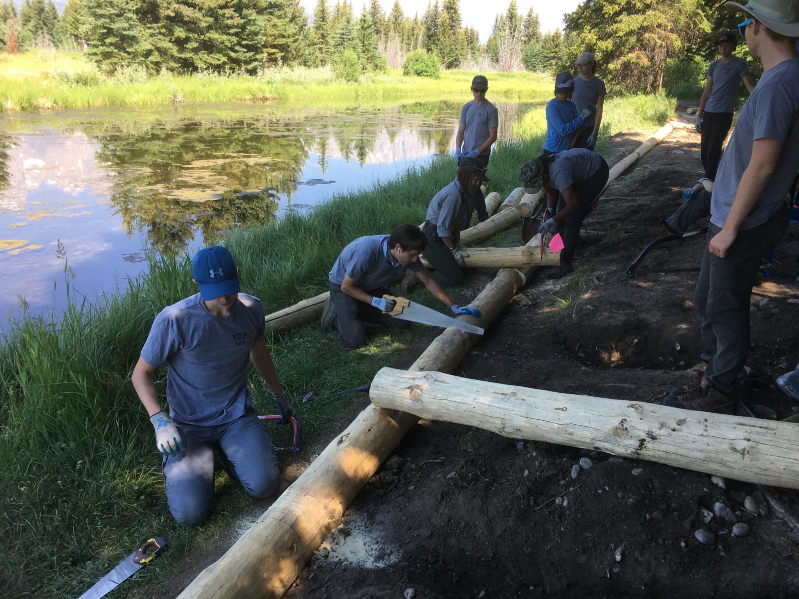 The team makes progress on the new retaining wall at Schwabacher Landing.