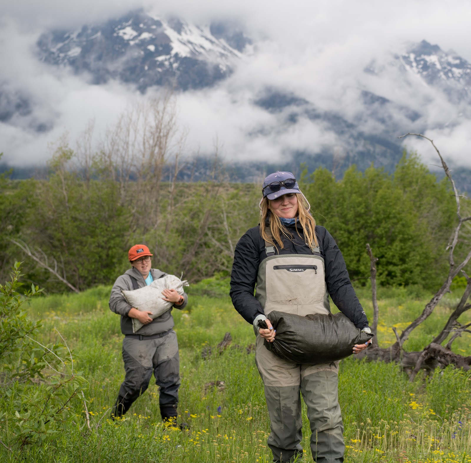 Sandbags are planted throughout the site, so the crew are often hauling these from one end of the stream to the other.